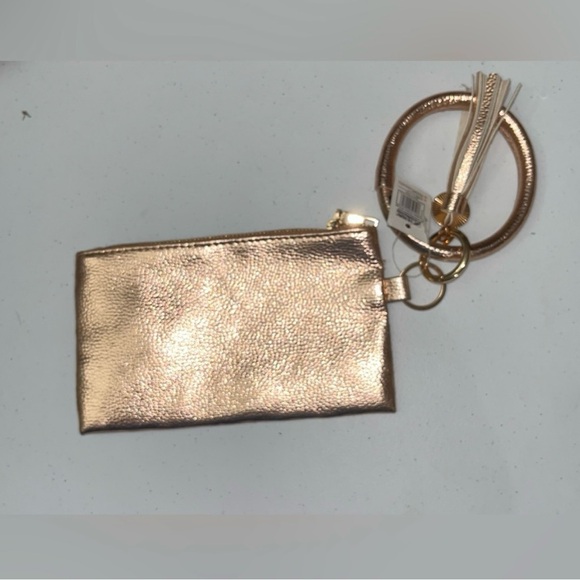 💙 NWT Rose Gold Wristlet with Tassel & Charm - Picture 1 of 6